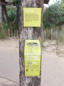Marked bins invite anglers to dispose of unwanted fishing lines. Credit: Susan Clayton.