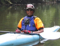 Image of Robert Allen in a kayak.