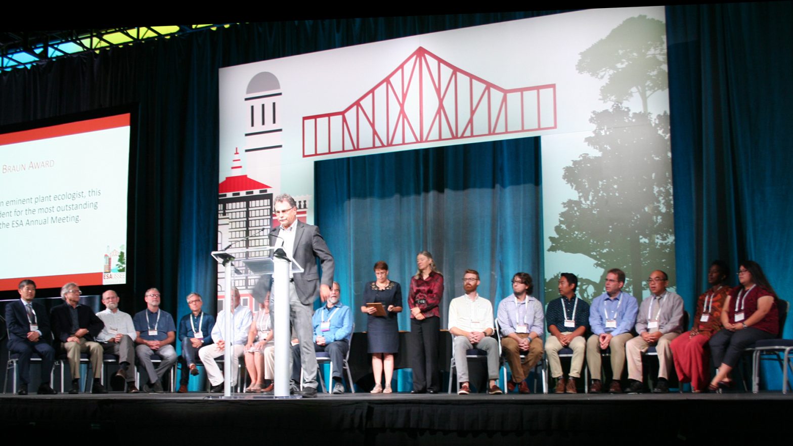 ESA Leadership stands on stage at the 2019 ESA Annual Meeting.