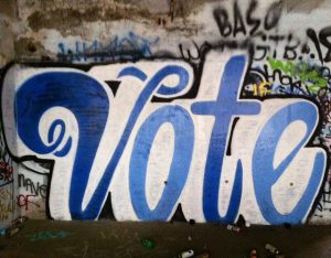 Graffiti painting of the word VOTE