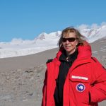 The Ecological Society of America's 2017 Eminent Ecologist, Diana Wall, takes a break from sampling soil biodiversity along an elevational transect as part of the McMurdo Dry Valley LTER project in Miers Valley, Antarctica (78°5.326 S, 163°46.382 E), in January 2013. Photo credit: Martijn Vandegehuchte