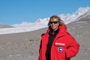 The Ecological Society of America's 2017 Eminent Ecologist, Diana Wall, takes a break from sampling soil biodiversity along an elevational transect as part of the McMurdo Dry Valley LTER project in Miers Valley, Antarctica (78°5.326 S, 163°46.382 E), in January 2013. Photo credit: Martijn Vandegehuchte