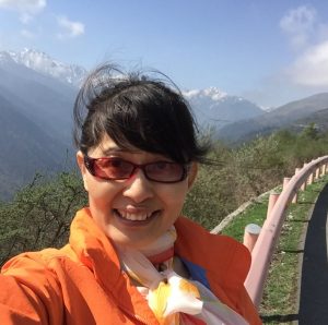 Shuxin Li, a research assistant at the Michigan State University Center for Systems Integration and Sustainability, visits Wolong Nature Reserve, China, in May 2016. Credit: Shuxin Li.