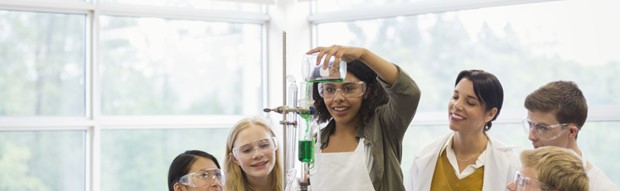 Teacher showing students chemistry titration at Florida A&M University's Viticulture Center