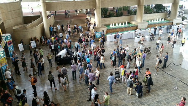 Overhead view of an annual meeting with hundreds of people.  The annual meeting sees generally 4,000 participants who all abide by the code of conduct described on this page.