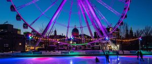 A ferris wheel with an ice skating rink.