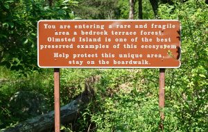 Sign describing biological diversity of Olmstead Island