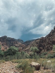 Rain clouds rolling in over an arid landscape