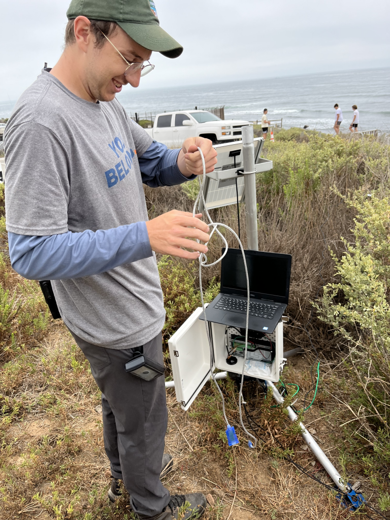 Person assembling a weather station