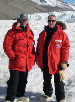 Philip Taylor and Henry Gholz stand together on a snowy mountain.